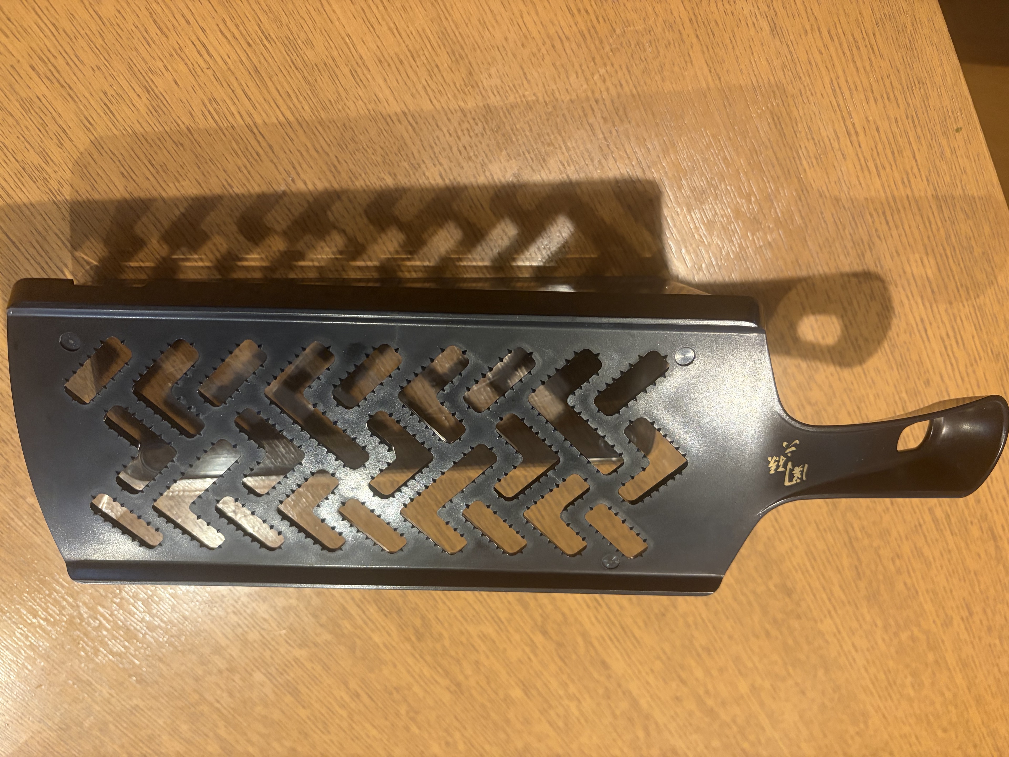 貝印 関孫六 コンパクトおろし器（受け皿付き）の写真